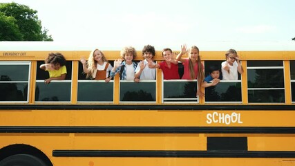 Children studying and having fun at school. Multiethnic group of kids going on a school trip with the bus