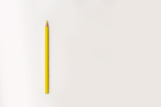 One Yellow Pencil On A White Background Copy The Space. The Concept Of Creativity, Hobbies, Business And Planning