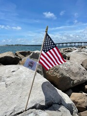 American July 4th flag flying at Norriego Point beach beach 