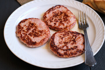 Three chicken meat burgers
