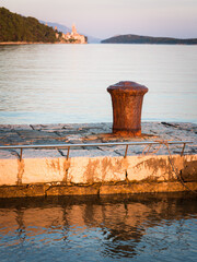 Fototapeta premium Old town of Rab with a pier in the foreground