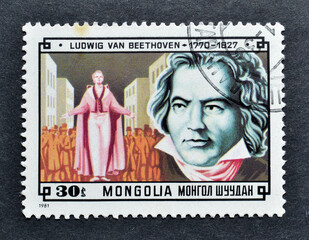 Cancelled postage stamp printed by Mongolia, that shows Ludwig Van Beethoven, circa 1971.