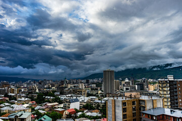Fototapeta premium Moody sky over Tbilisi's downtown