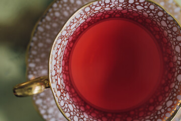 pink tea in light pink and gold vintage teacup 