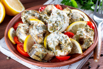 Fried fish steaks with sauce. Healthy food. Fried white fish