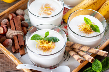Fresh banana yogurt with oats, delicious dessert for healthy breakfast