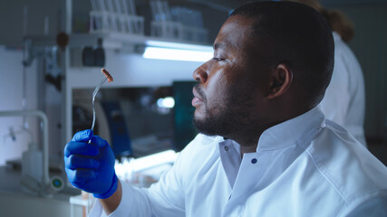 Black scientist eating cell based meat