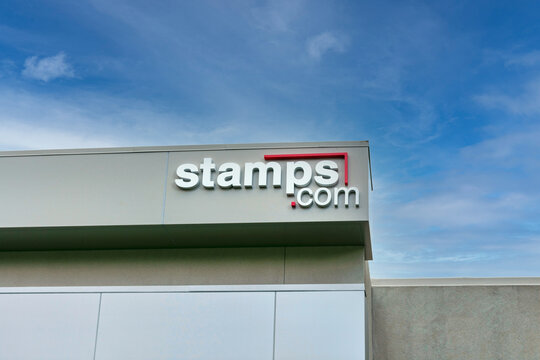 Stamps.com sign on company office in San Francisco Bay Area. Stamps.com provides Internet-based mailing and shipping services - Sunnyvale, California, USA - 2021