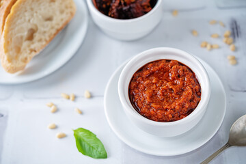 Dried tomatoes nuts pesto in a bowl