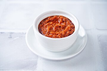 Dried tomatoes nuts pesto in a bowl