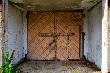 closed gates of an old abandoned farm