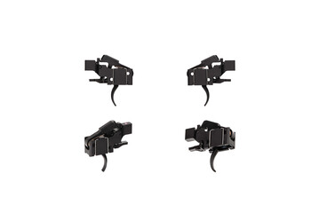 Shock trigger for gun isolate on white back. Gun trigger. Repair spare part.