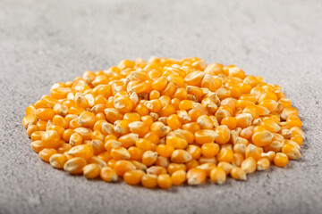 Dried corn. Raw corn for popcorn on the table.