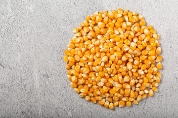 Dried corn. Raw corn for popcorn on the table.