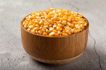 Dried corn. Raw corn for popcorn on the table.