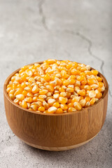 Dried corn. Raw corn for popcorn on the table.