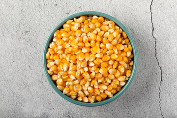 Dried corn. Raw corn for popcorn on the table.