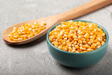 Dried corn. Raw corn for popcorn on the table.