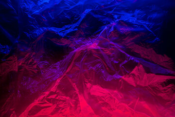 plastic bag crumpled with light to be used as an abstract texture