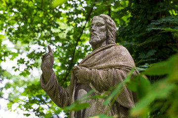 Historic Statue on the mystery old Prague Cemetery, Czech Republic
