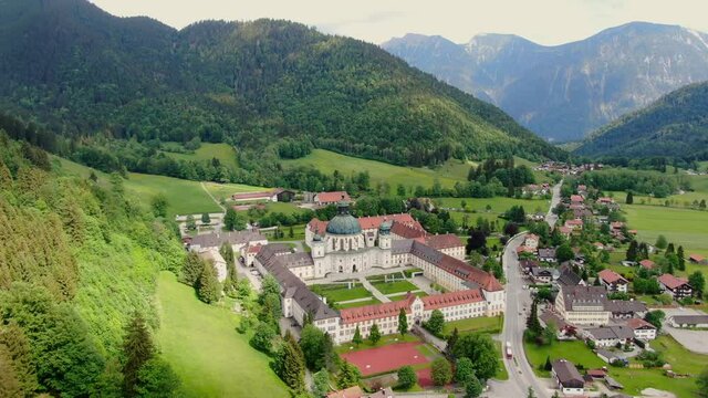 Ettal Abbey, called Kloster Ettal, a monastery in the village of Ettal, Bavaria, Germany - aerial photography