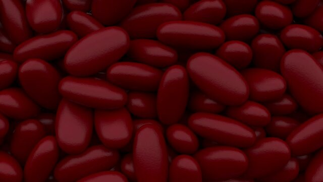 Red falling 3D pills pouring, filling a screen isolated on a black background with luma matte. Candy, dragee