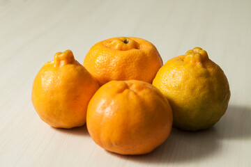 Top view of tangerines on the table with copy space. Orange, sweet and tropical citrus fruit. Fruit concept. Tangerine concept.
