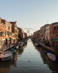 Fototapeta na wymiar Boats stationed canal Venice