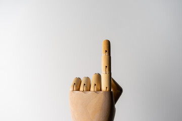 Wooden hand with number 1 posture point or touch on white background, isolate, Business and design concept.