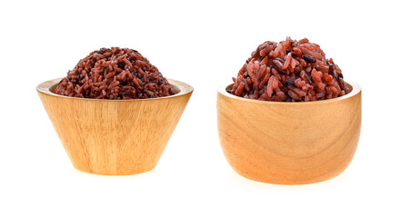 brown rice in wood bowl on white background