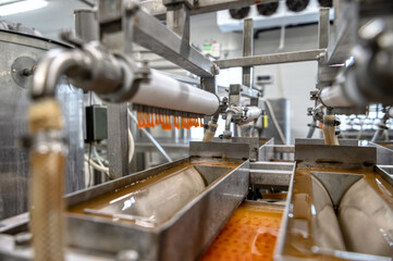 The machine makes artificial red caviar.