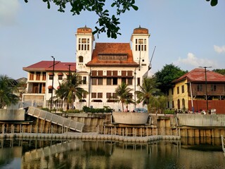 Kota tua, Jakarta, Indonesia - (06-10-2021) : Historical building during the Dutch colonial period. Right in front of it is a big river sungai