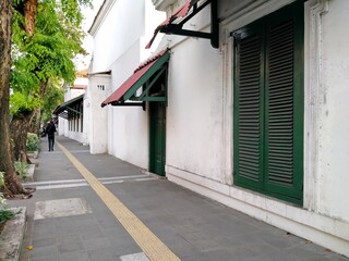 Kota tua, Jakarta, Indonesia - (06-10-2021) : Street atmosphere for pedestrians who are close to historical buildings