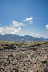 the view on the top of Mount Soputan, and seen from a distance a group of climbers