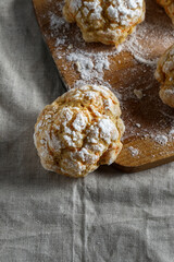 Homemade cookies on a table with a linen tablecloth