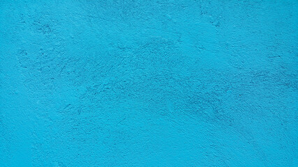 Abstract texture of blue-green plaster on the walls. Concrete screed. The background image. Copy the place for the text. Construction design surface. Rough wallpaper.