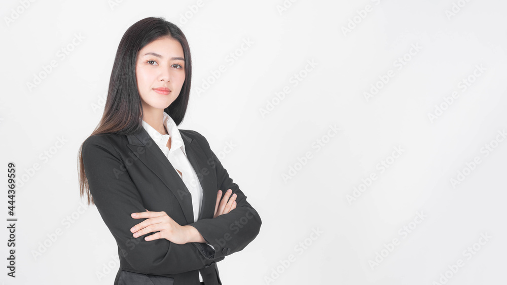 Wall mural Portrait beautiful working Asian woman , business girl standing arms crossed with happiness on white background