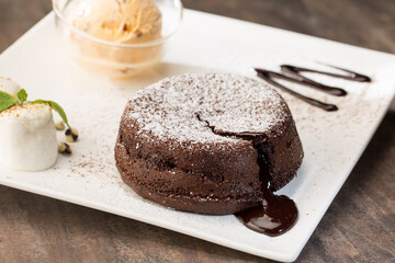 Lava hot cake with vanilla ice cream and mash mallow. Cake. Chocolate cake. Close up.