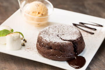 Lava hot cake with vanilla ice cream and mash mallow. Cake. Chocolate cake. Close up.