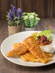Close up of the fish and chip. Western food. Fast food. Salad. Sauce.