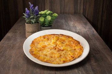  Fast food. Hawaii Chicken Pizza. Western Food. Pizza. Pineapple. Cheese. Chicken. Close up of pizza. Café or restaurant background. Dinner or lunch.