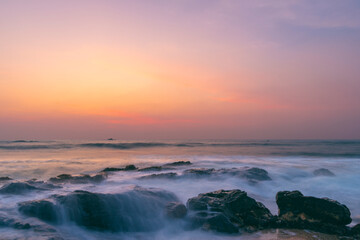 A long exposure image of a dusk on Galle shoreline in Sri Lanka