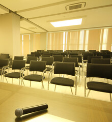 Professional microphone in meeting room. Empty meeting room.