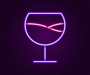 Glowing neon line Wine glass icon isolated on black background. Wineglass sign. Colorful outline concept. Vector