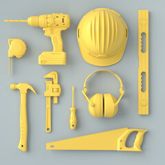 Top view of monochrome construction tools for repair on grey and yellow