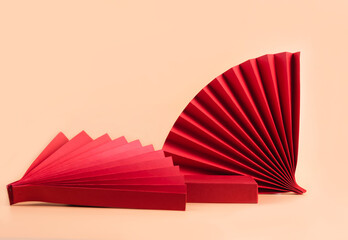 Abstract fashion podium for advertising cosmetics products. Red podium paper oriental fan pink...