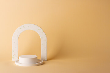 Composition with concrete decorations in the style of minimalism on a delicate background