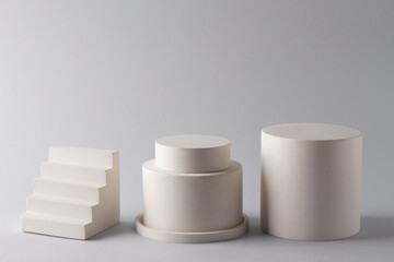 Composition with concrete decorations in the style of minimalism on a delicate background