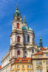 Tower of the baroque Nicholas church in Prague, Czech Republic