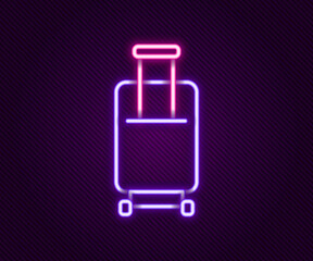 Glowing neon line Suitcase for travel icon isolated on black background. Traveling baggage sign. Travel luggage icon. Colorful outline concept. Vector